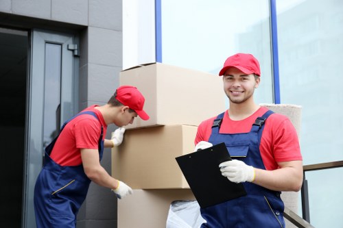 Driver and crew maintaining safe working standards during a moving service