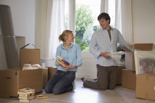 Boxes and labelled packing supplies arranged for a smooth move in Merton