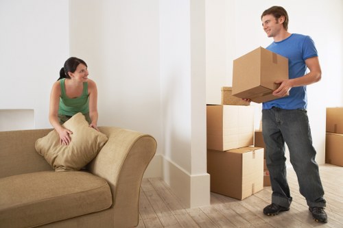 Moving team handling a home relocation in a Merton street