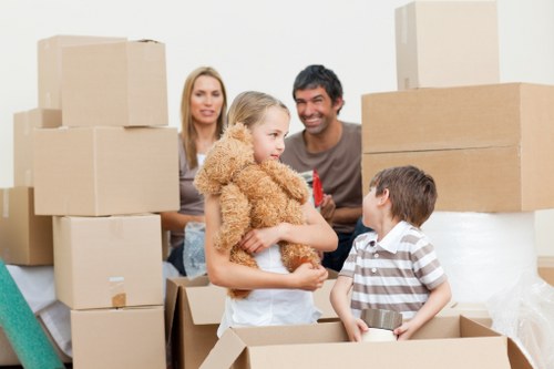 Packed boxes and furniture ready for removal in Merton