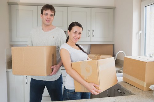 Boxes and household items being carefully packed for a Merton man and van move
